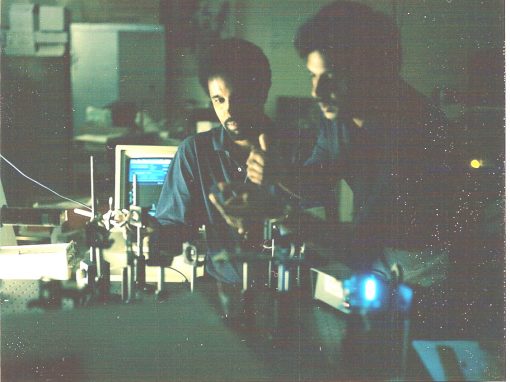 Professor Misra with Dr. Abdullahi H. Nur aligning the ultraviolet beam