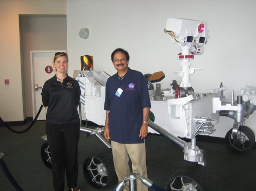 Diane Pugel and Prof. Misra posing with the Curiosity rover model.