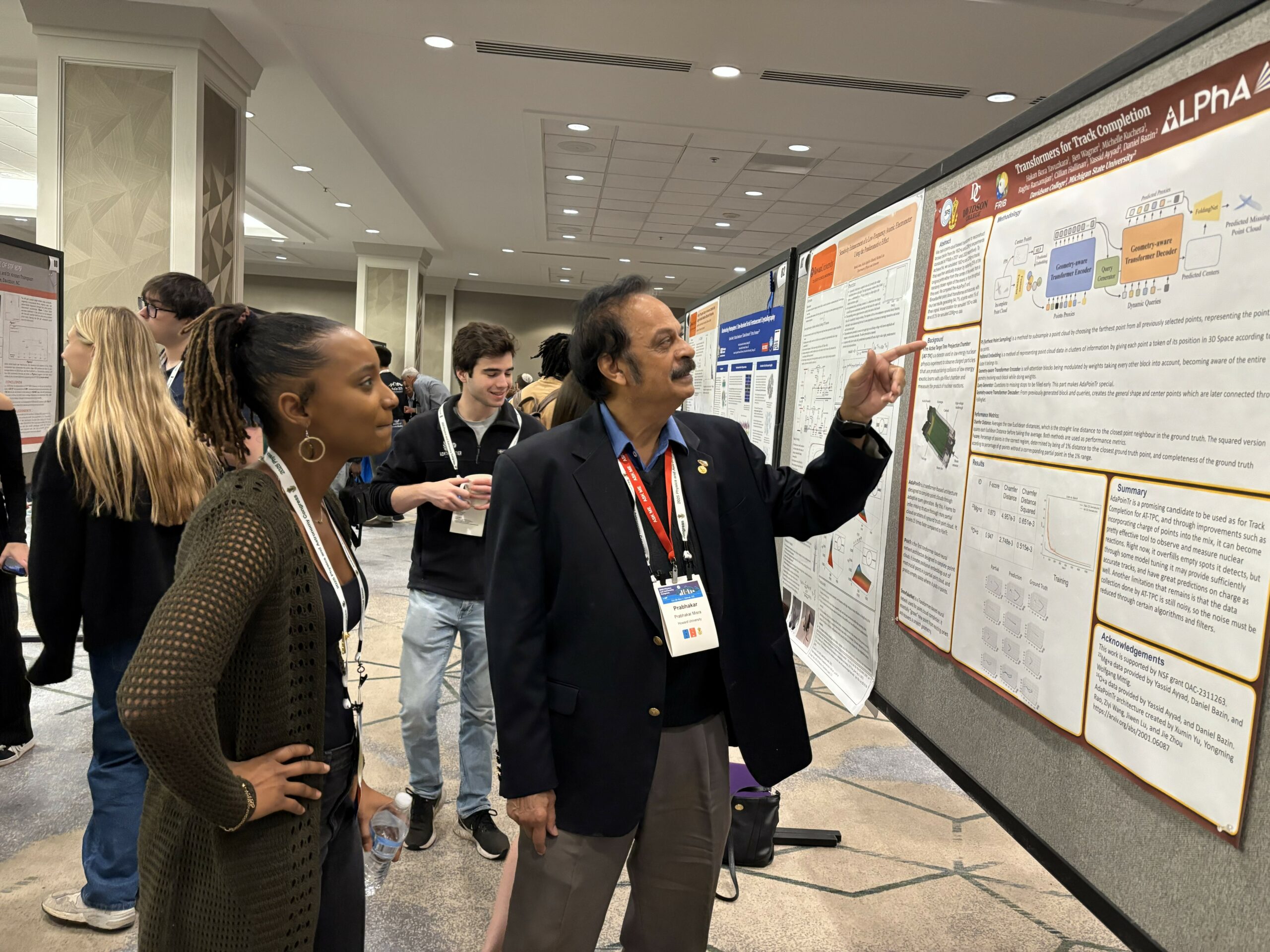 Dr. Misra Judging a Student’s Poster at the SPS Congress Fall 2025