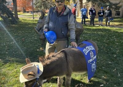 Dr. Misra with the Colorado School of Mines Mascot at the SPS Congress Fall 2025
