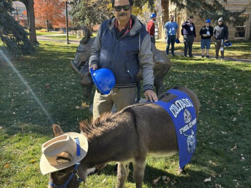 Dr. Misra with the Colorado School of Mines Mascot at the SPS Congress Fall 2025